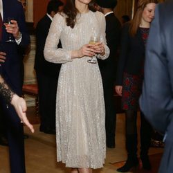Kate Middleton con un vestido brilly en una recepción en el Palacio de Buckingham