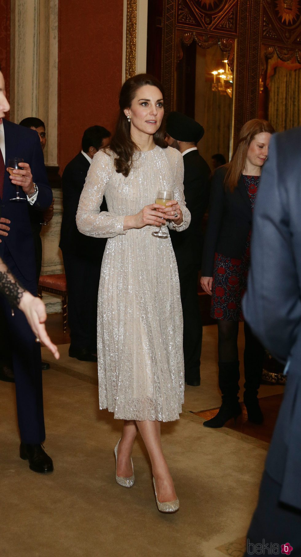 Kate Middleton con un vestido brilly en una recepción en el Palacio de Buckingham