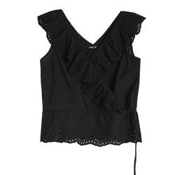 Top negro con mangas vaporosas   de la colección Beachwear SS18 de Oysho