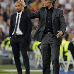 Guardiola y Mourinho durante un partido
