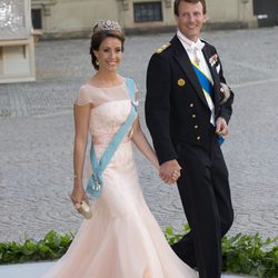 La Princesa Marie de Dinamarca con un vestido rosa palo en la boda de Magdalena de Suecia y Chris O'Neill