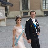 La Princesa Marie de Dinamarca con un vestido rosa palo en la boda de Magdalena de Suecia y Chris O'Neill